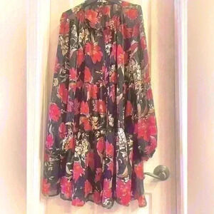 Pretty, sheer floral dress. Beautiful colors. Never worn. Size Large